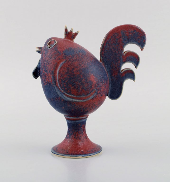 Lars Drejara, Sweden. Rooster in glazed stoneware. Beautiful glaze in shades of purple and turquoise. Late 20th century.