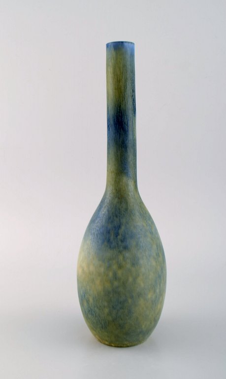 Carl Harry Stålhane for Rörstrand. Narrow neck vase in glazed ceramics. Beautiful blue-green double glaze. Mid-20th century.