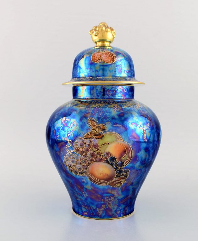 Large Rosenthal lidded jar in blue glazed porcelain with hand-painted fruits, butterflies and gold decoration. 1920s / 30s.