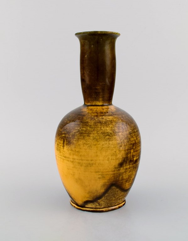 Svend Hammershøi for Kähler, HAK. Narrow neck vase in glazed stoneware. Beautiful yellow uranium glaze. 1930s / 40s.