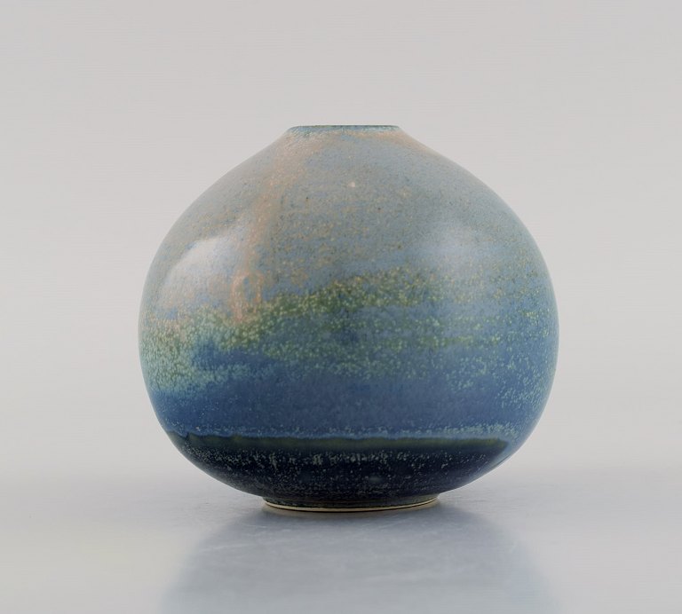 Swedish ceramicist. Unique vase in glazed ceramics. Beautiful speckled glaze in blue and green shades. Late 20th century.