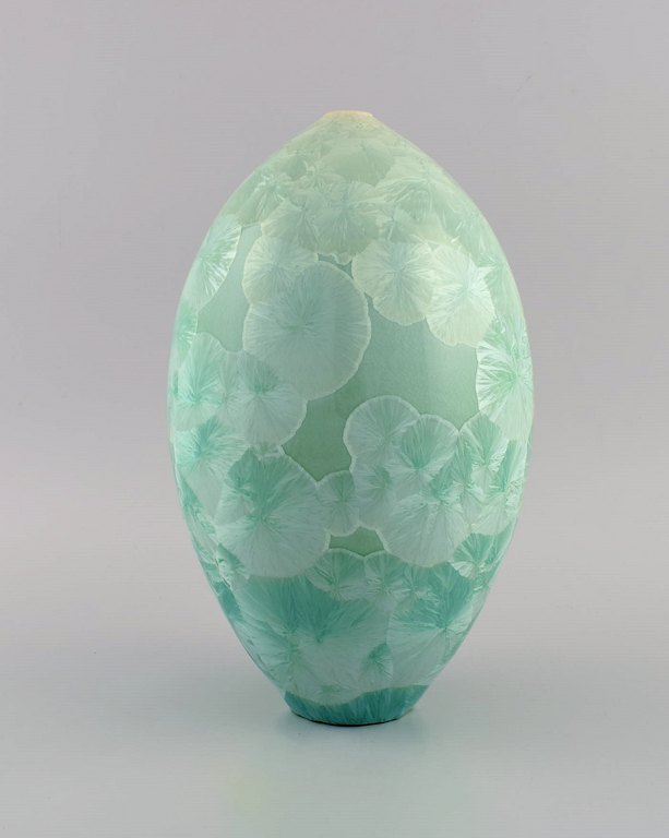 European studio ceramicist. Vase in glazed stoneware. Beautiful crystal glaze in turquoise shades. Late 20th century.