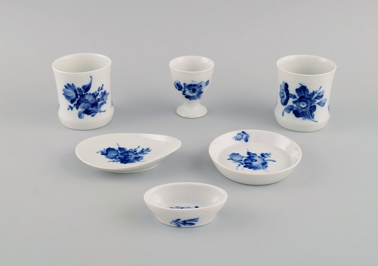 Five parts Royal Copenhagen Blue Flower Braided porcelain.Egg cup, two vases and three small bowls.