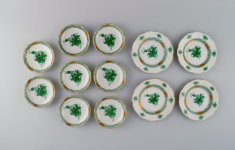Herend Green Chinese Bouquet. Eight small bowls and four plates in hand-painted porcelain. Mid-20th century.