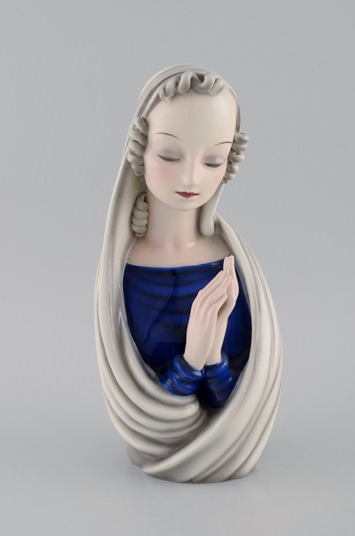 Rudolf Knörlein (1902-1982) for Goldscheider. Art deco figure in glazed ceramics. Praying Madonna. 1940s.