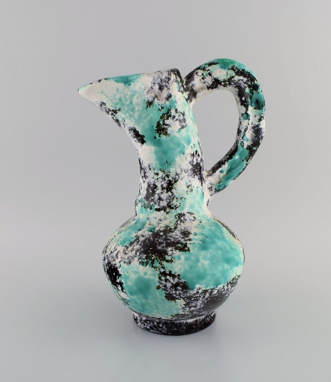 Jerome Massier (1850-1916) for Vallauris. Antik freeform kande i glaseret stentøj. Smuk polykrom glasur. Tidligt 1900-tallet.