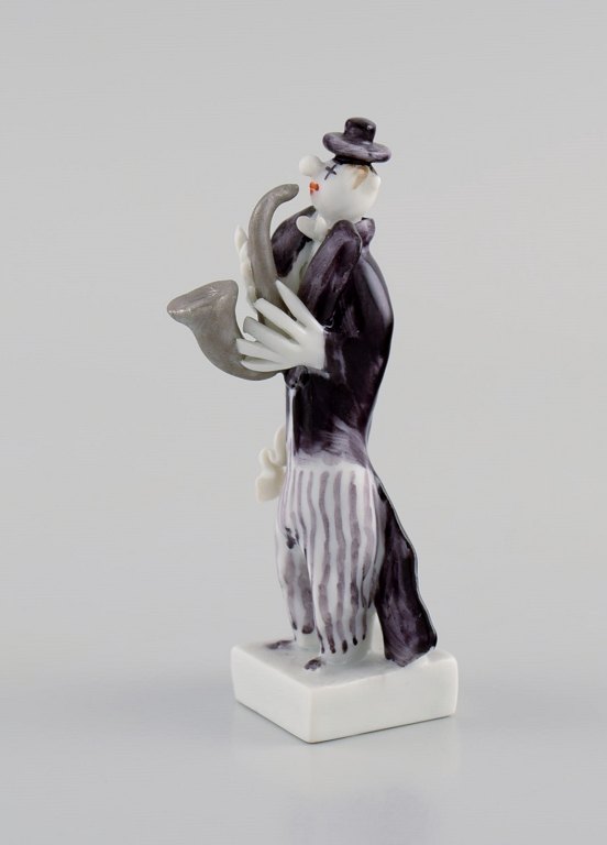 Peter Strang (b.1936) for Meissen. Figure in hand-painted porcelain. Saxophonist from the clown orchestra. Late 20th century.
