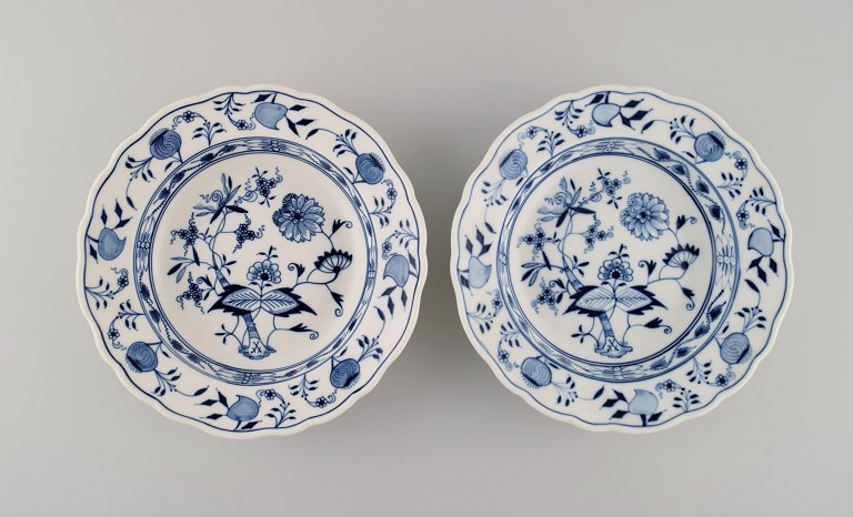 Two Meissen Blue Onion deep plates in hand-painted porcelain. Early 20th century.
