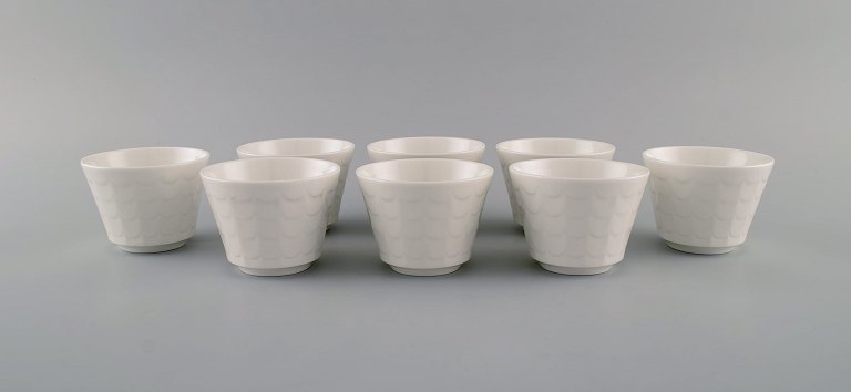 Wilhelm Kåge for Gustavsberg. Eight cups in white glazed porcelain. Swedish design, 1960s.