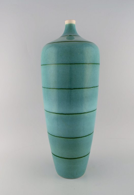 European studio ceramicist. Large floor vase in glazed ceramics. Beautiful glaze in turquoise shades. Late 20th century.