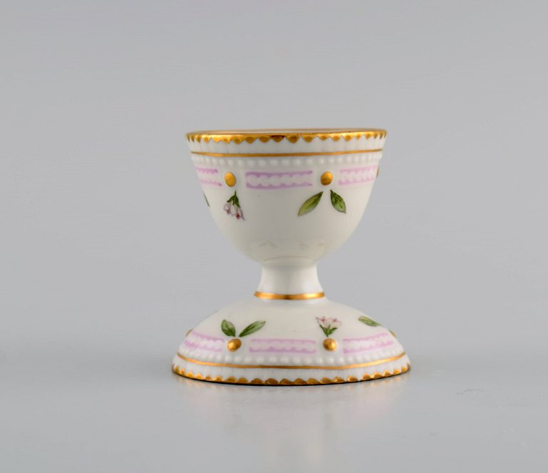 Royal Copenhagen Flora Danica egg cup in hand-painted porcelain with flowers and gold decoration. Model number 20/3530.