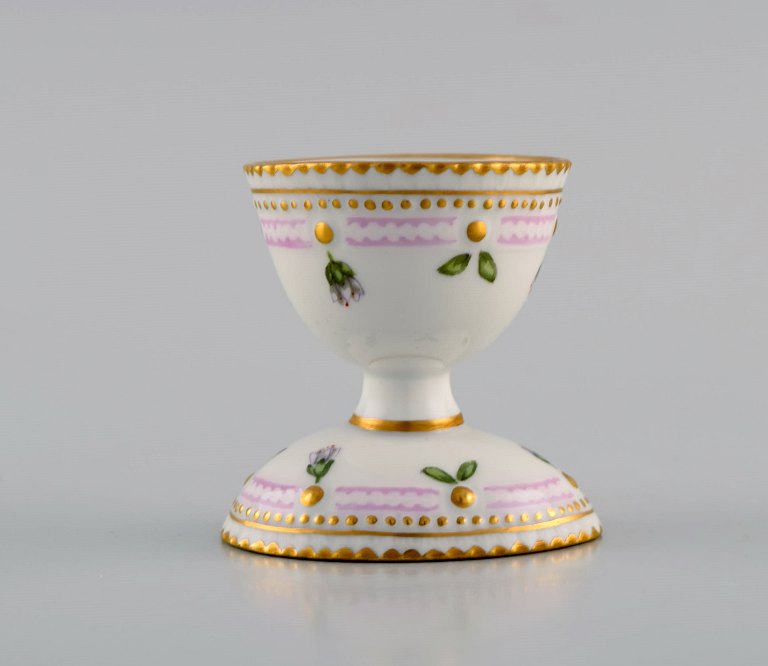 Royal Copenhagen Flora Danica egg cup in hand-painted porcelain with flowers and gold decoration. Model number 20/3530.