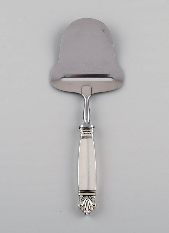 Georg Jensen Acanthus cheese slicer in sterling silver and stainless steel.