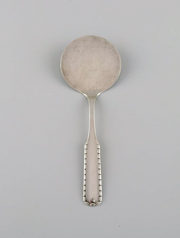 Early Georg Jensen Rope serving spade in silver (830). Dated 1915-1930.