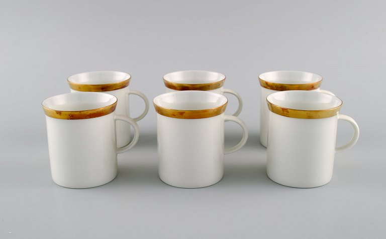 Six Rosenthal Berlin coffee cups in porcelain with gold edge. Mid-20th century.
