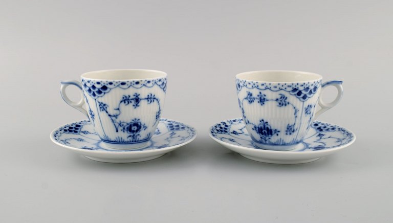 Two Royal Copenhagen Blue Fluted Half Lace coffee cups with saucers. Model number 1/756.