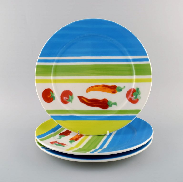 Rosenthal Designers Guild. Orchard Collection. Three large porcelain cover plates. Striped design, tomatoes and chillies. Late 20th century.