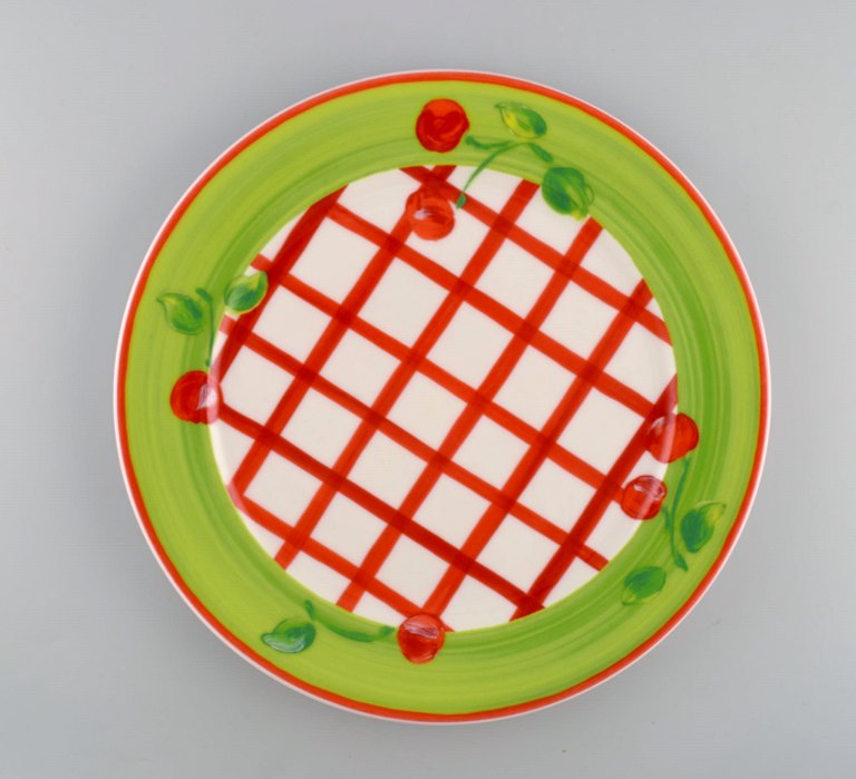 Rosenthal Designers Guild. Orchard Collection. Large porcelain cover plate. Checkered design, green border and cherries. Late 20th century.