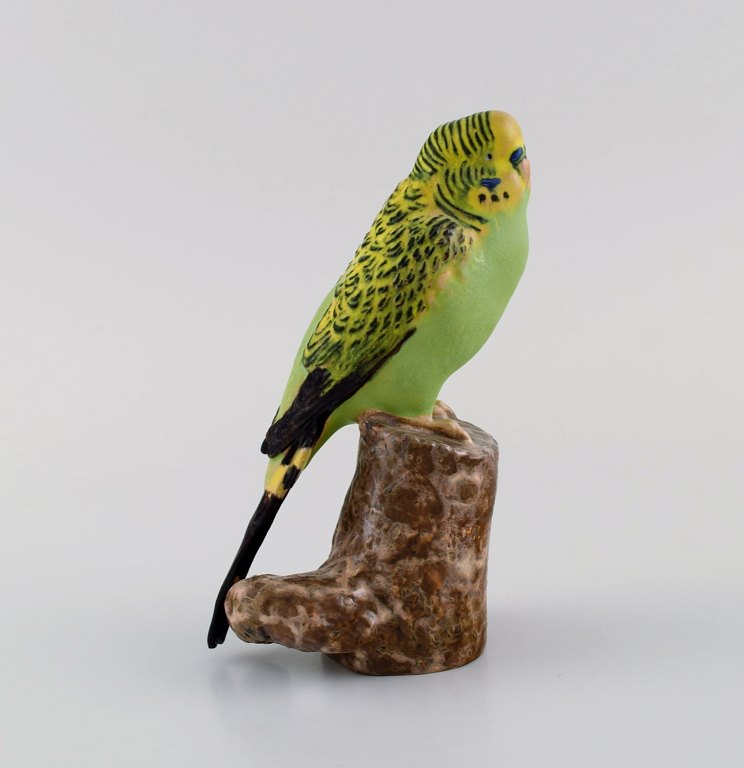 Jeanne Grut for Royal Copenhagen. Figure in hand-painted and glazed faience. Budgerigar. 1970s.