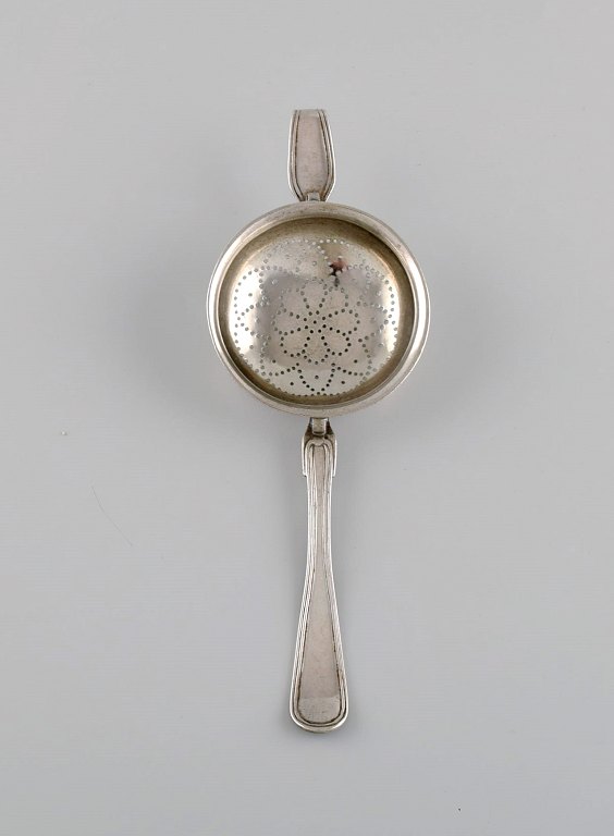 Danish silversmith. Antique silver (830) tea strainer. Dated 1874.