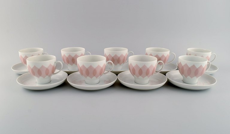 Bjørn Wiinblad for Rosenthal. Lotus porcelain service. 9 coffee cups with saucers decorated with pink lotus leaves. 1980s.