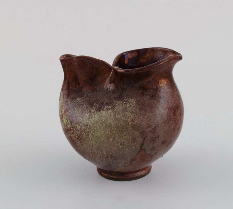European studio ceramist. Small unique vase / jug in glazed stoneware. Beautiful luster glaze. 1960s / 70s.
