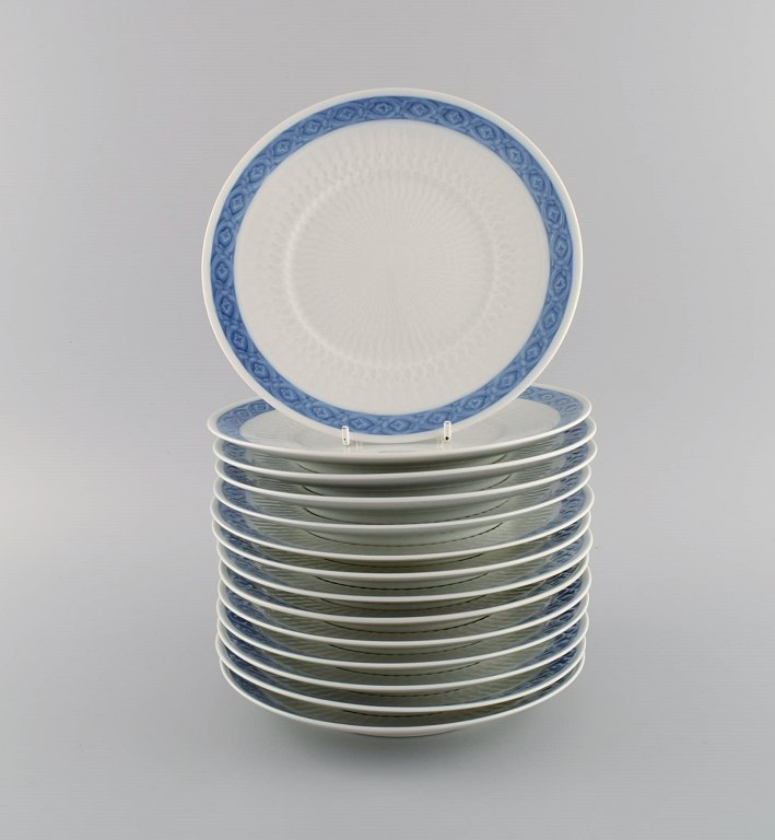 14 Royal Copenhagen Blue Fan lunch plates. 1960s / 70s. Model number 1212/11521. Designed by Arnold Krog in 1909.