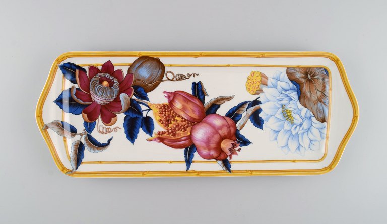 Porcelain of Paris. "Tropical Aurore". Oblong porcelain tray decorated with flowers, pomegranates and bamboo. 1980s.