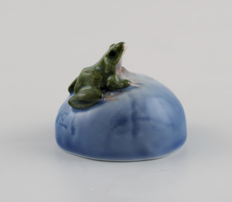 Royal Copenhagen porcelain figure. Frog on stone.