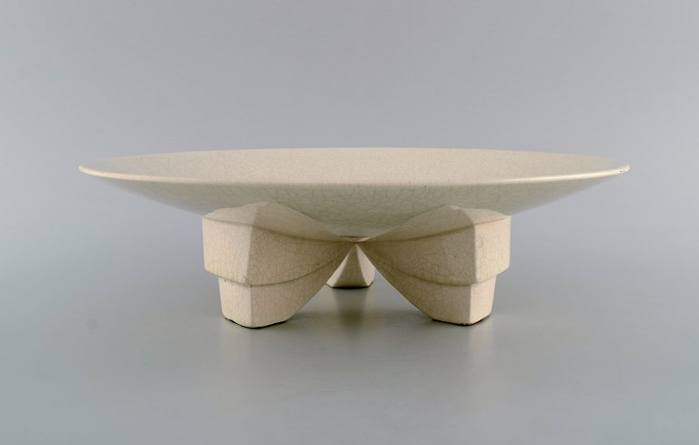 Longwy, France. Art deco bowl in glazed stoneware on tripod. Crackle design. 1940s.