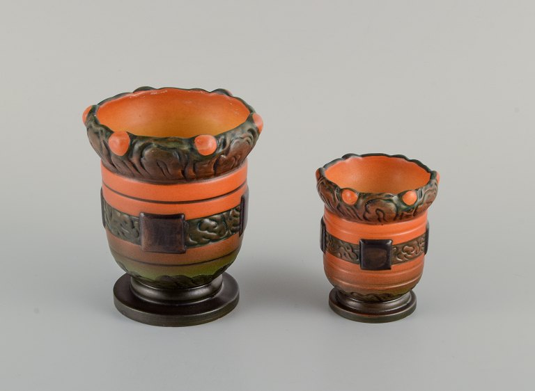 Ipsens Denmark. Two Art Nouveau jars in hand-painted glazed ceramic.
