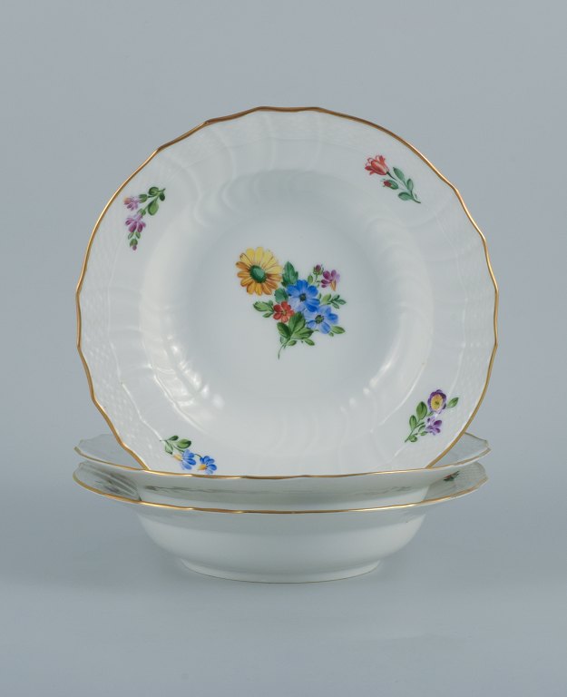 Royal Copenhagen Light Saxon Flower. Three deep plates in hand-painted porcelain.