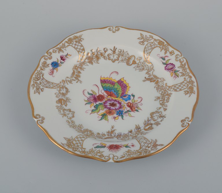 Meissen, Germany, antique hand painted plate decorated with flowers, butterfly and gold.