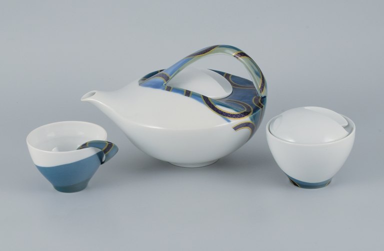 French designer, avant-garde style, unique egoist tea service in hand-painted porcelain consisting of teapot, sugar bowl and teacup.
