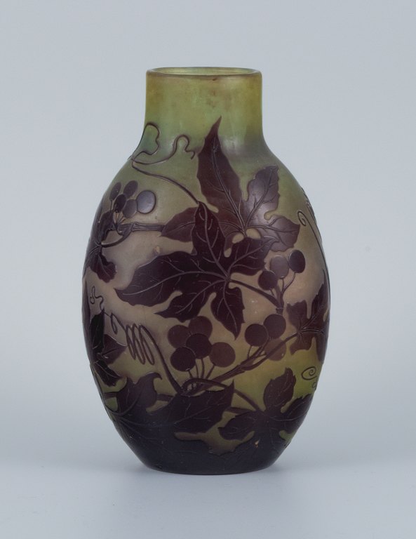 Émile Gallé (1846-1904), France. Vase in mouth-blown art glass with purple foliage in relief.