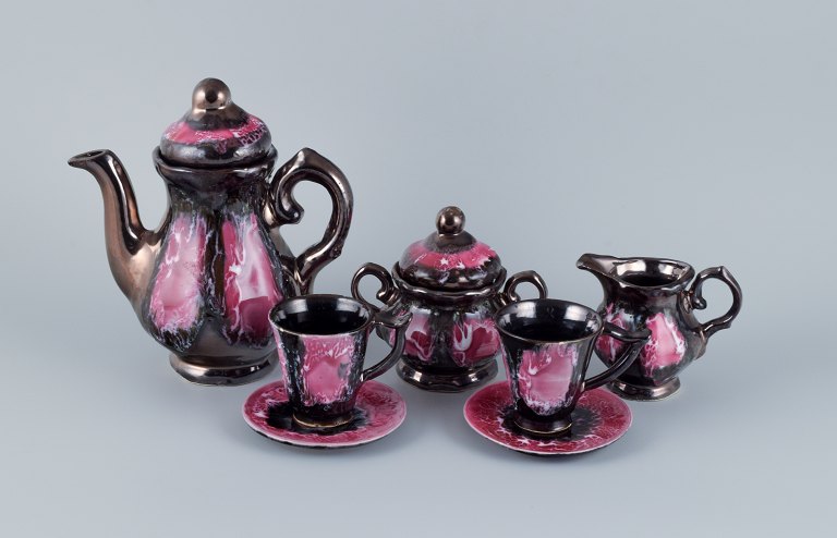Vallauris, France, ceramic coffee service for two consisting of a total of seven parts. Luster glaze.