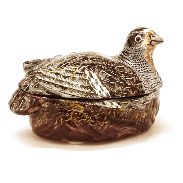 Polychrome Rococo faience tureen in the shape of a partridge. Signed, Marieberg, Sweden, circa 1770. H: 9,5cm. L: 16cm