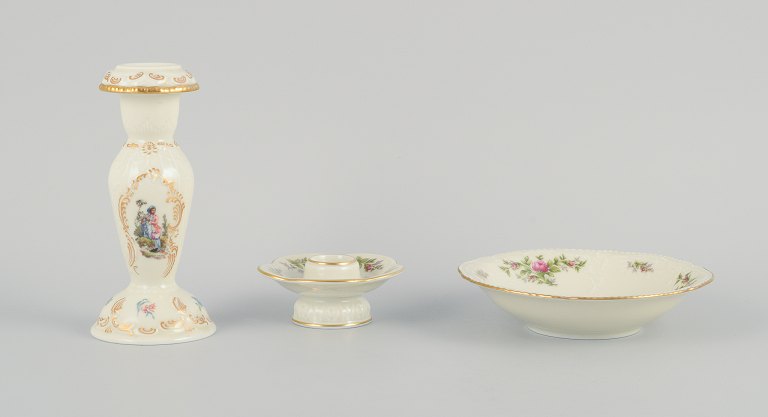 Rosenthal, Germany. "Sanssouci", two candlesticks and a small bowl decorated with flowers and gold decoration.