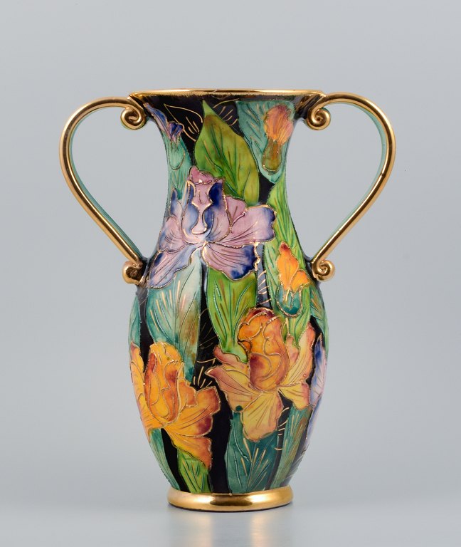 Vallauris, France, large ceramic vase decorated with floral motifs and gold handle.