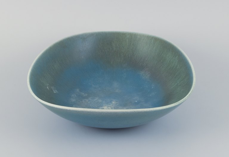Berndt Friberg for Gustavsberg, Sweden, large ceramic bowl with glaze in blue-green tones.