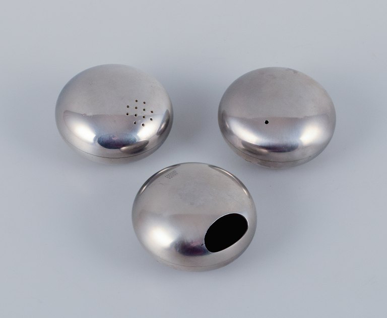 Georg Jensen, three pieces in stainless steel. Salt and pepper shakers and ashtray, in stylish Danish design.