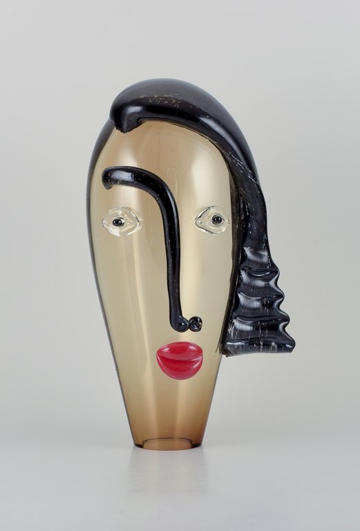 Murano, Venice, Italy, unique art glass sculpture with a female face. Mouth-blown glass.