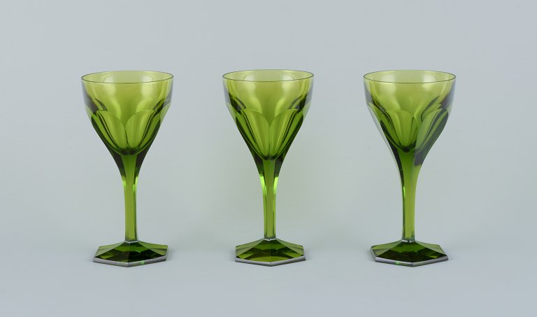Val St. Lambert, Belgium. A set of three green Legagneux white wine crystal glasses.