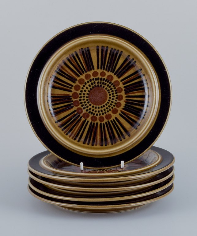 Gunvor Olin-Grönqvist for Arabia, "Cosmos", a set of five lunch plates in stoneware. Retro-style stoneware with green-brown glaze.