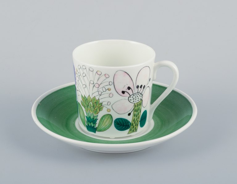 Stig Lindberg for Gustavsberg, Sweden. Rare "Tahiti" coffee cup with  saucer. Hand-painted with floral motifs. Retro style.