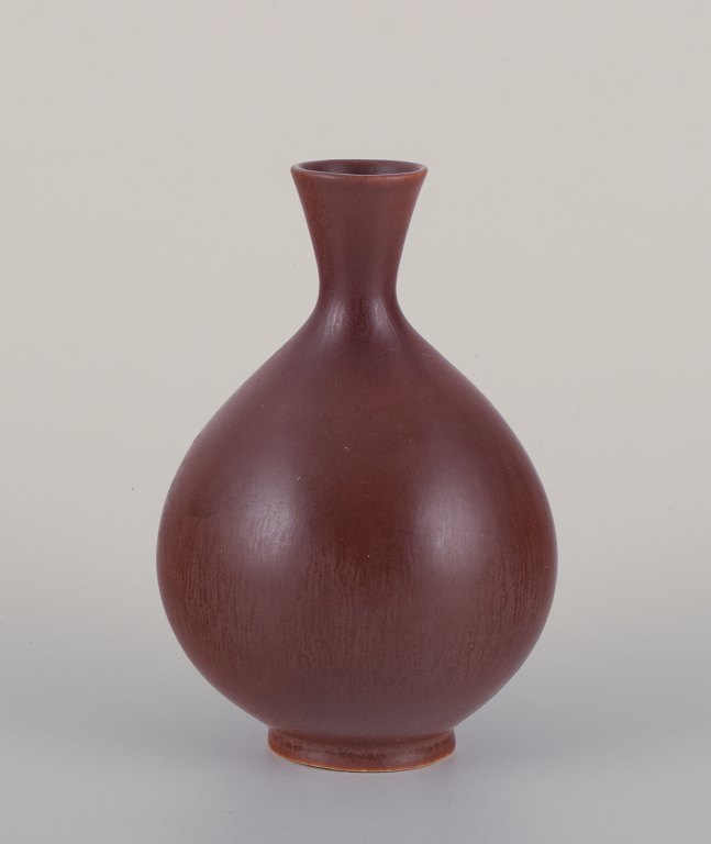 Berndt Friberg for Gustavsberg, Sweden. Ceramic vase with brown glaze. Bulbous shape.