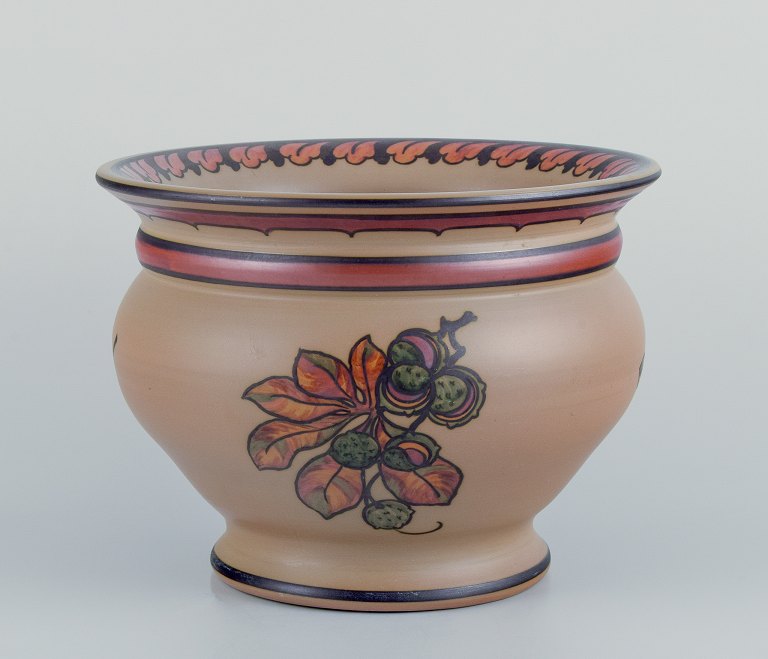 Hjorth, island of Bornholm, Denmark. Large ceramic jar. Hand-painted with floral motifs.