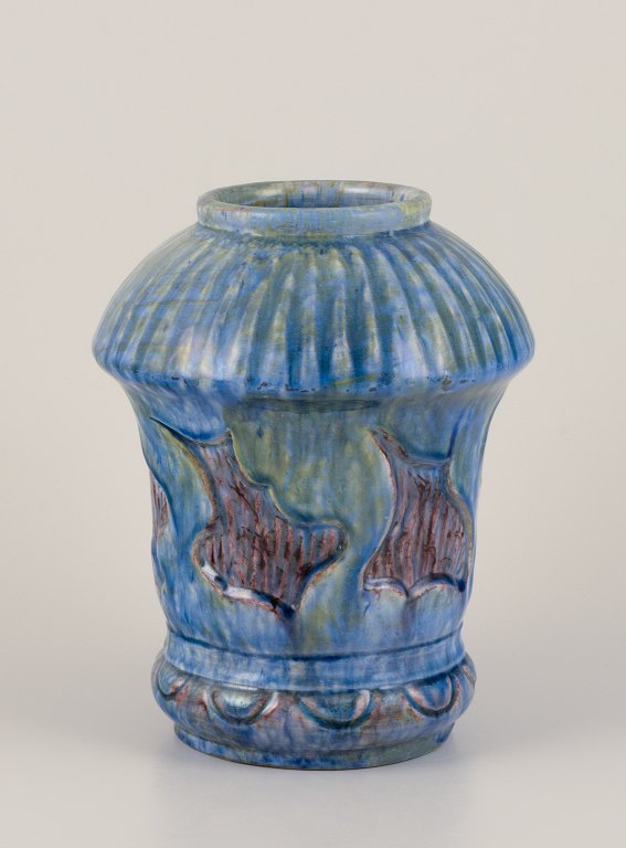 Møller & Bøgely, Denmark. Danish Art Nouveau ceramic vase in the style of Bindesbøll. Glaze in blue and green tones.