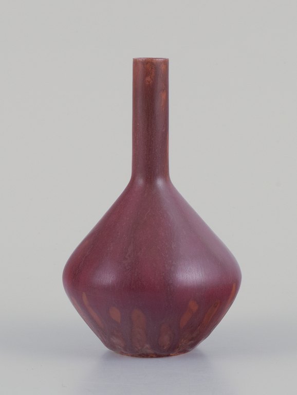 Carl Harry Stålhane (1920-1990) for Rörstrand, Sweden. Ceramic vase with a slender neck. Brown-toned glaze.
