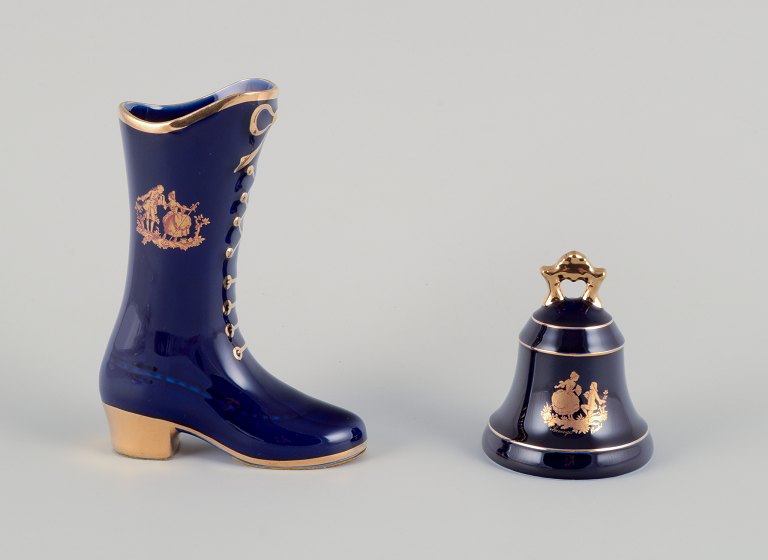 Limoges, France. Porcelain boot and table bell decorated with 22-karat gold leaf and a beautiful royal blue glaze. Scène galante.